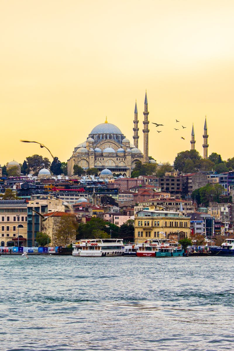 Beautiful view of İstanbul's skyline with the Suleymaniye Mosque at sunset. Perfect for travel and architecture enthusiasts.